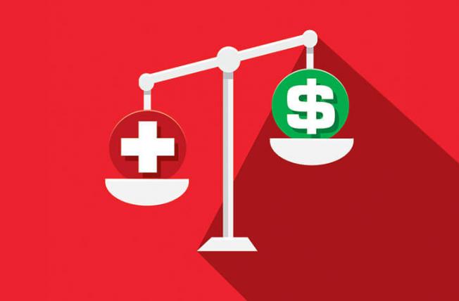 Scale balancing money and healthcare
