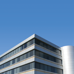 A view of the IHPI building against a clear blue sky.